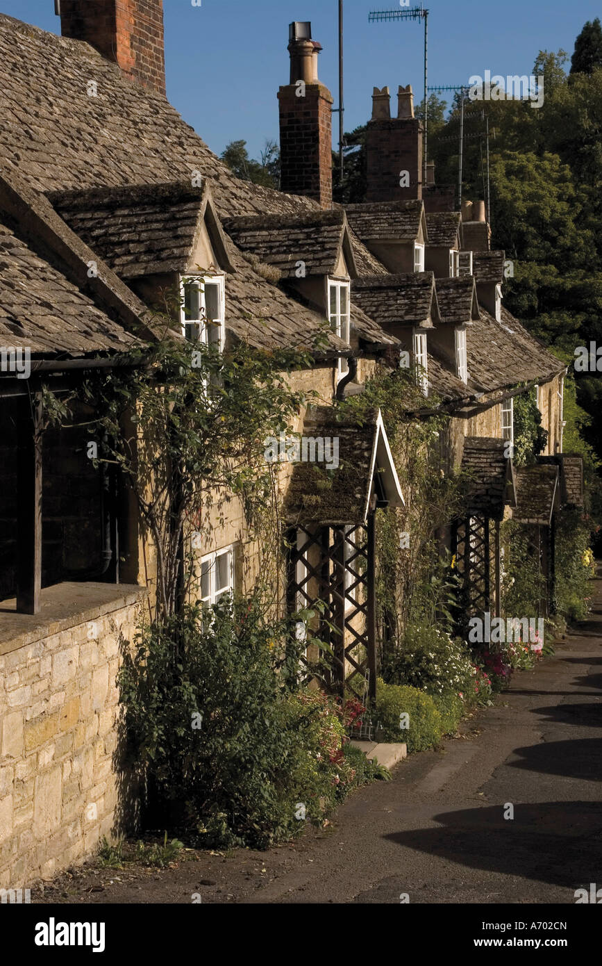 Honey coloured terraced cottages The Cotswolds Gloucestershire England United Kingdom
