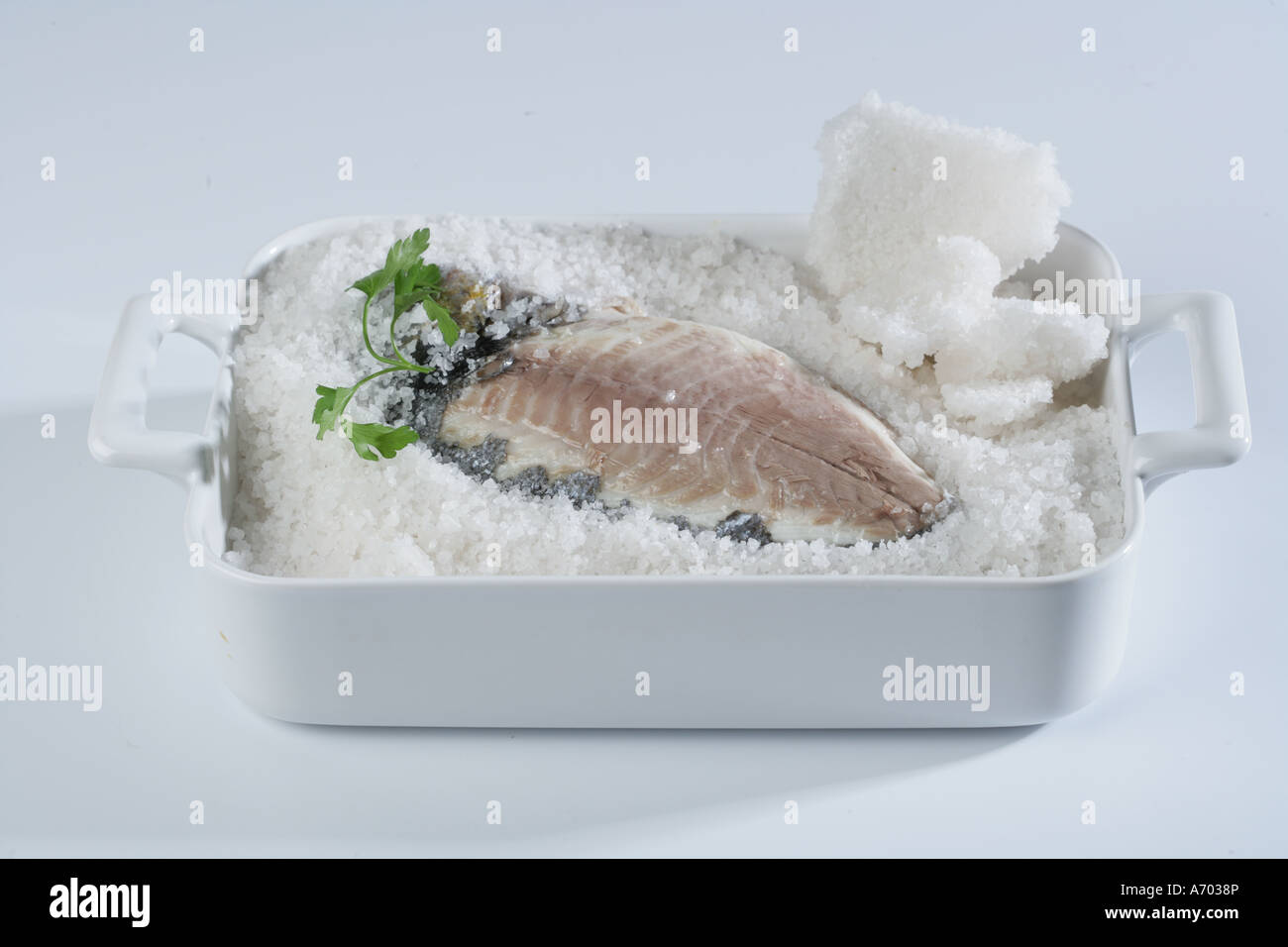 Sea bream baked in salt Stock Photo Alamy