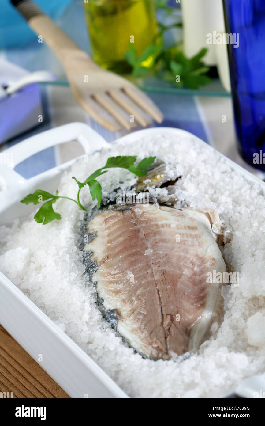 Sea bream baked in salt Stock Photo Alamy