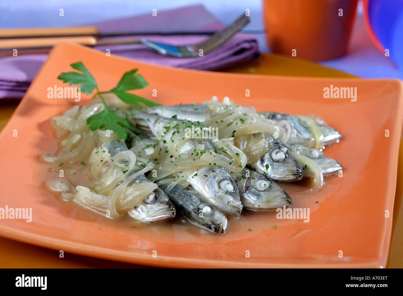 Young horse mackerel with onions Stock Photo Alamy