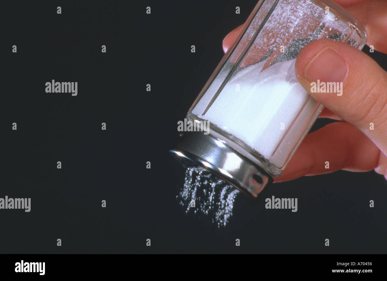 food spice salt hand with a saltshaker Stock Photo