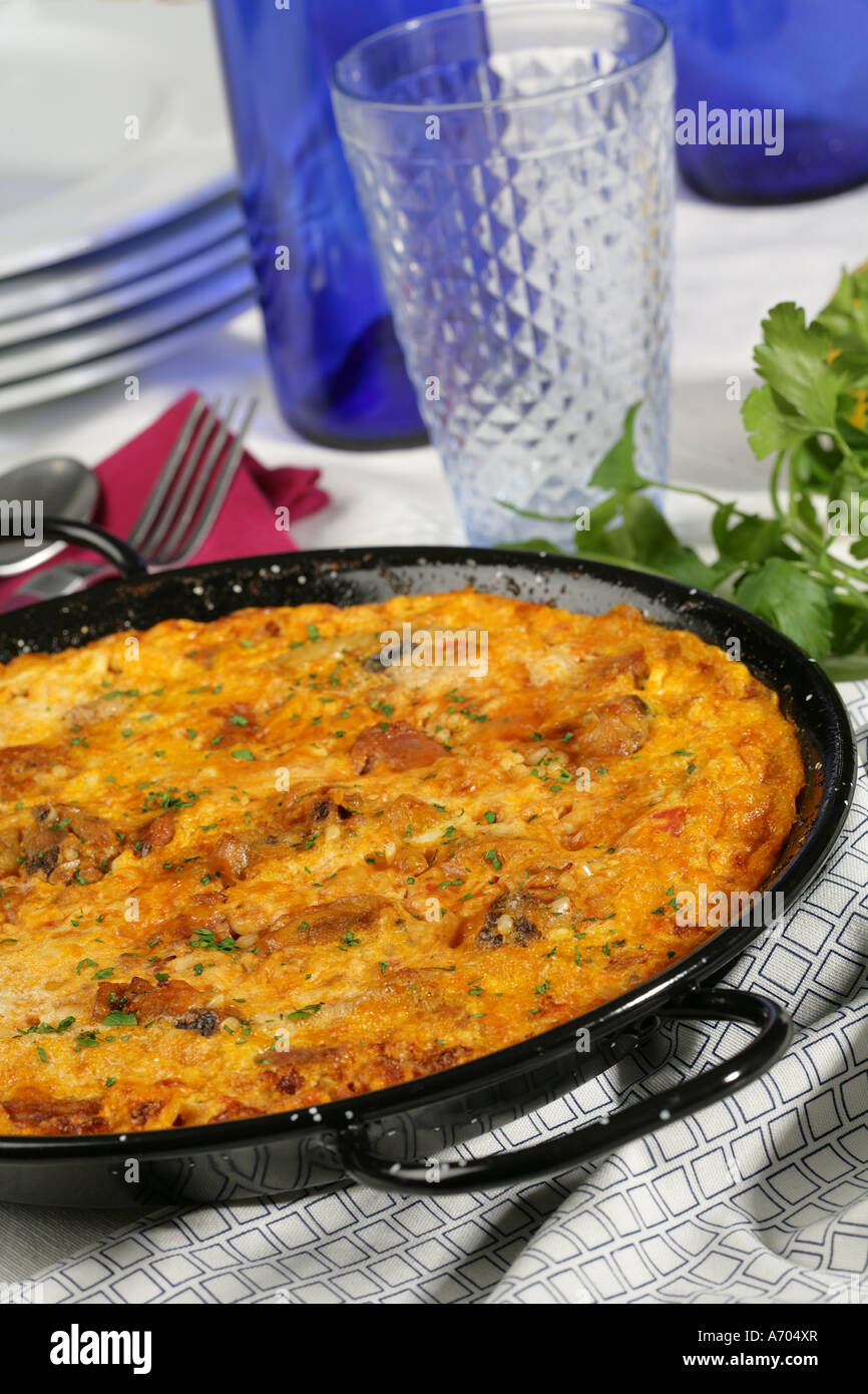 Rice with egg crust served in paella Stock Photo Alamy