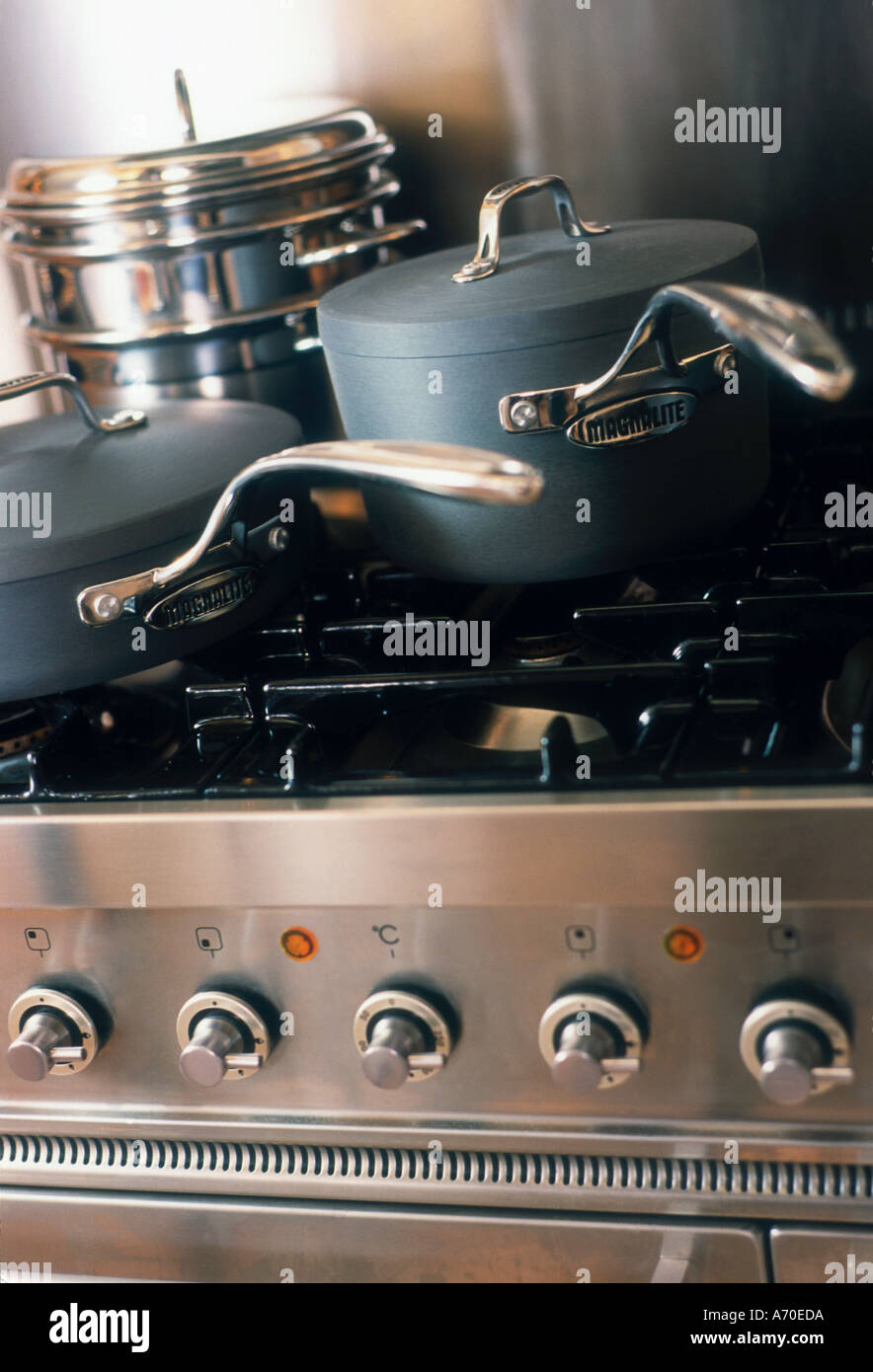 Saucepans on hob of Britannia stove Stock Photo Alamy