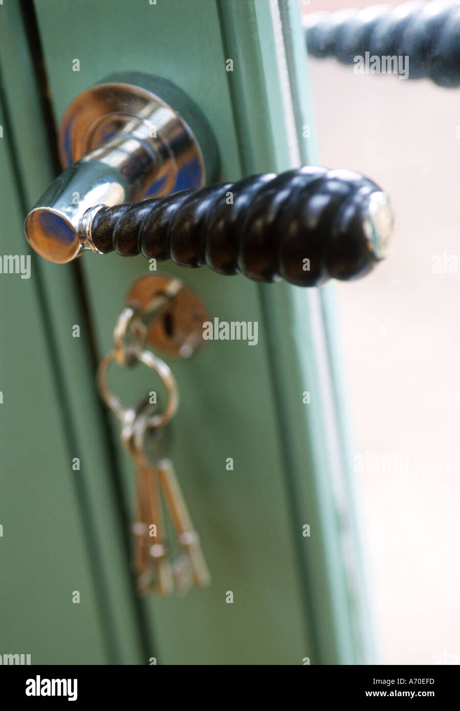 Black twisted door handle Stock Photo - Alamy