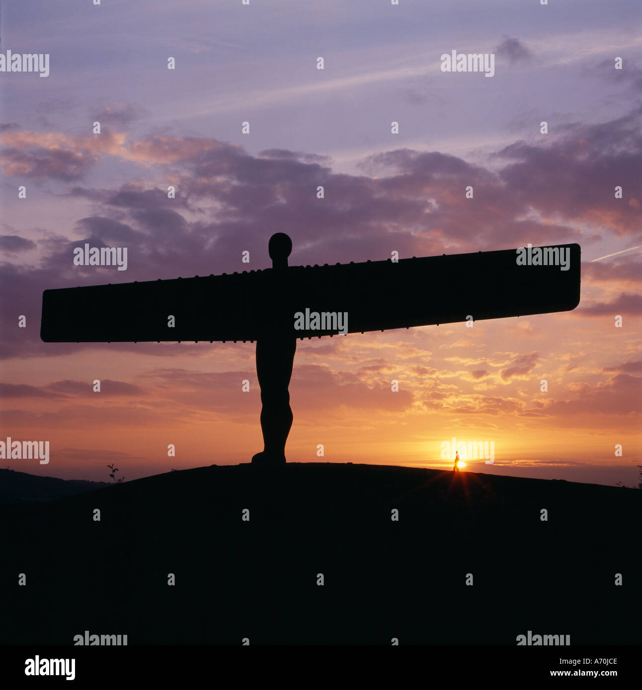 ANGEL OF THE NORTH SCULPTURE BY ANTHONY GORMLEY AT SUNSET WITH MAN FOR ...
