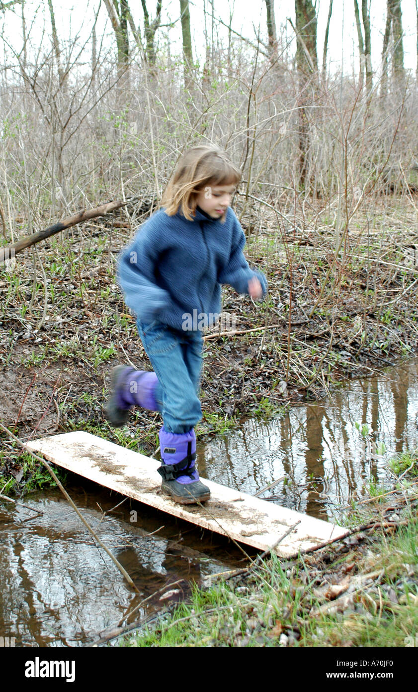 Child crosses over bridge Stock Photo - Alamy