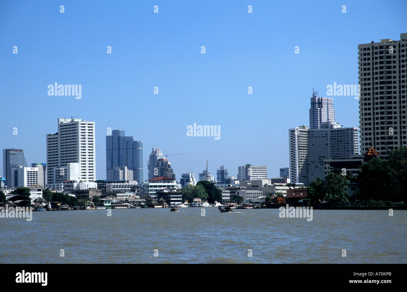 Traffic on the Chao Phraya River and Bangkok skyline Thailand Stock ...