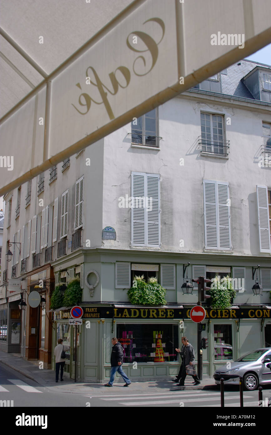 Looking out from a cafe towards one of the Laduree tea rooms in St Germain des Pres Paris France Stock Photo