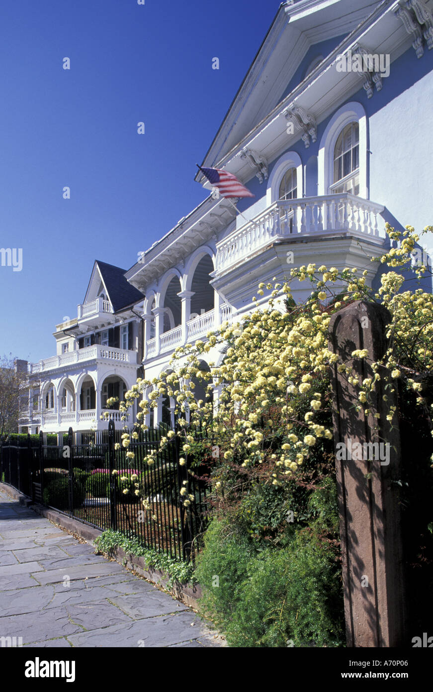 NA, USA, South Carolina, Charleston. Row of historic homes on South Battery Street; patriotism Stock Photo