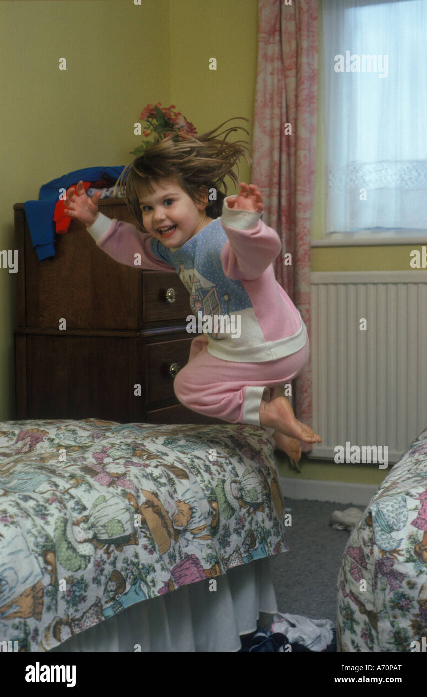 child bouncing on the bed Stock Photo Alamy