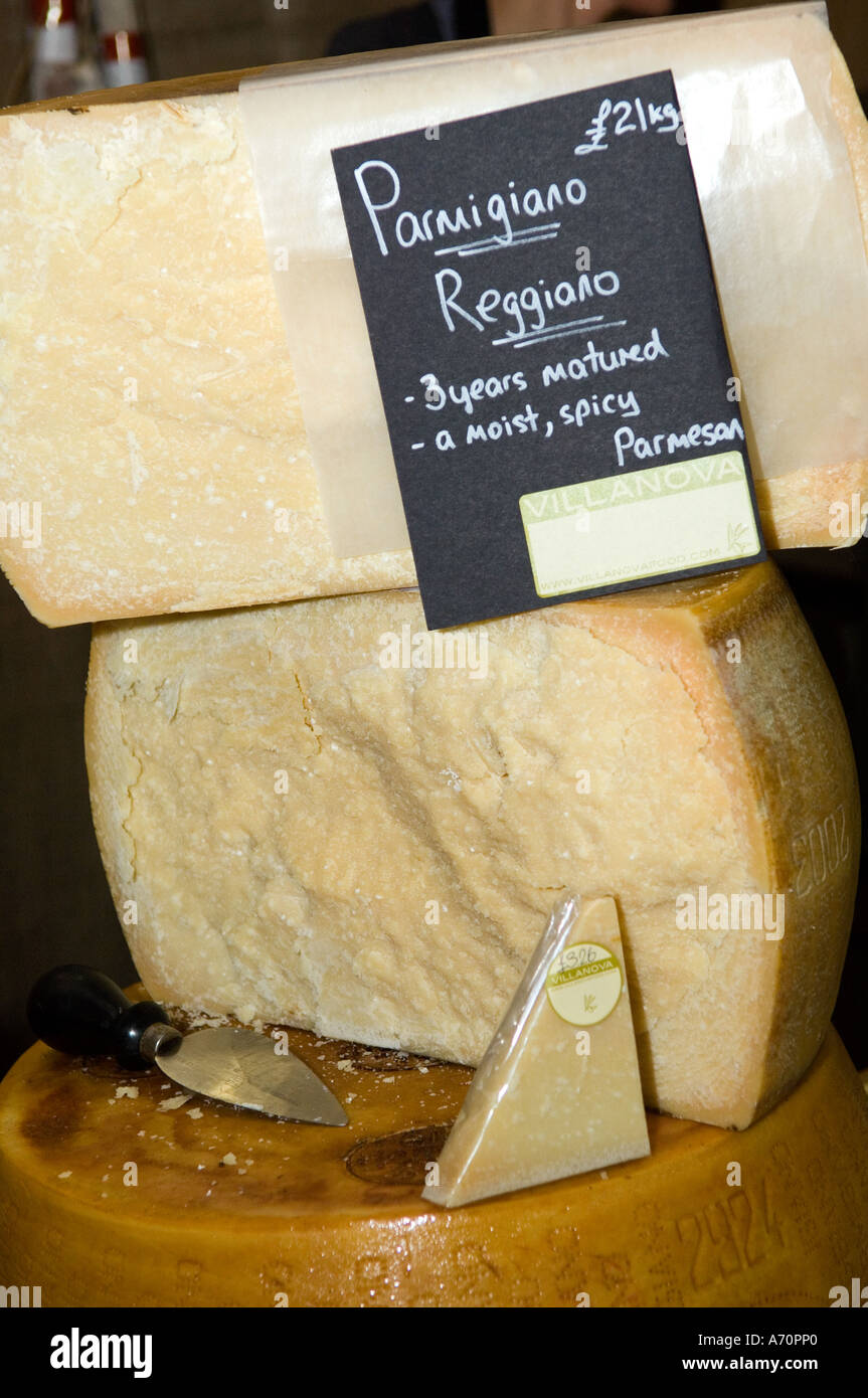 Parmesan wheels with price tag in british shop Stock Photo Alamy