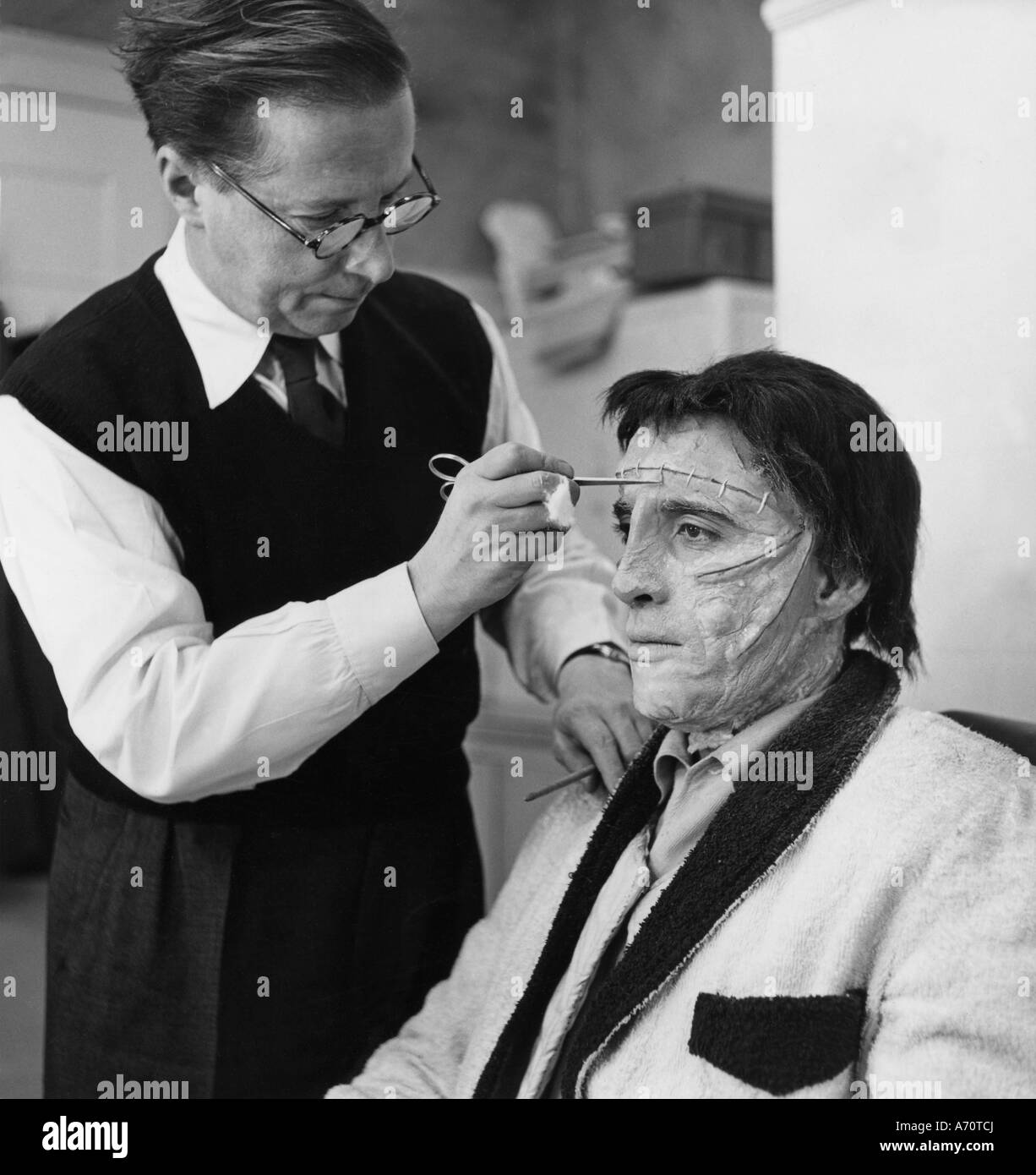 CURSE OF FRANKENSTEIN Peter Cushing is madeup for the 1957 Warner ...