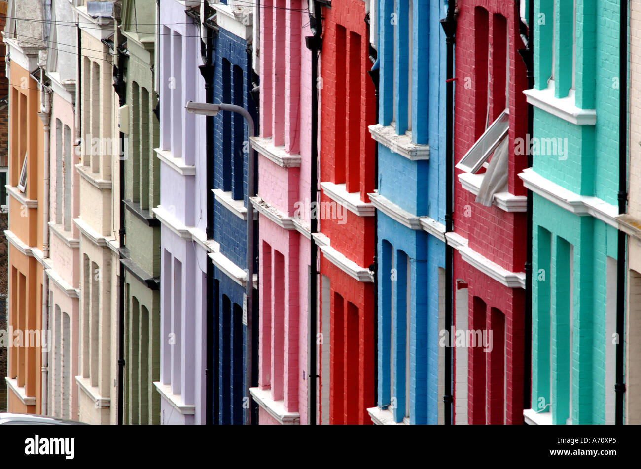 Brightly multicoloured painted terraced houses in Blaker Street Brighton East Sussex Stock Photo