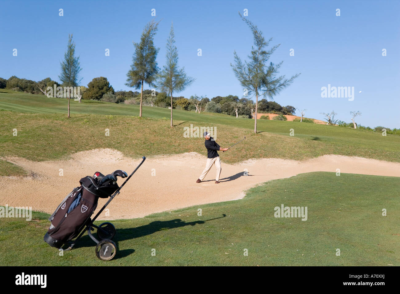 Alhaurin de la Torre,  Malaga Province,  inland Costa del Sol, southern Spain.  Lauro Golf course. One man playing. Stock Photo