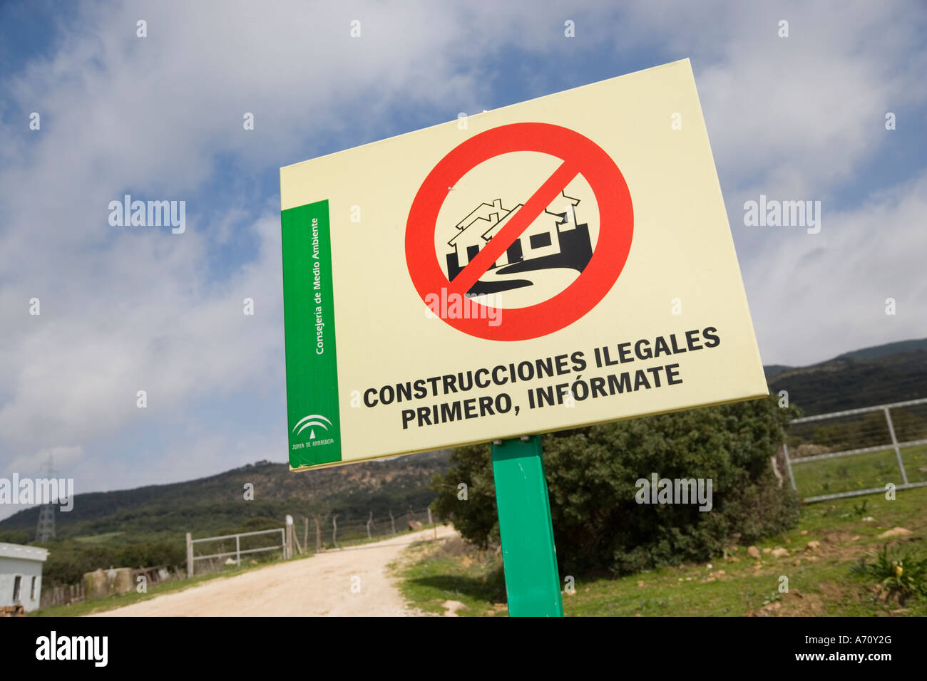 Sign in Spanish language warning against illegal construction Stock