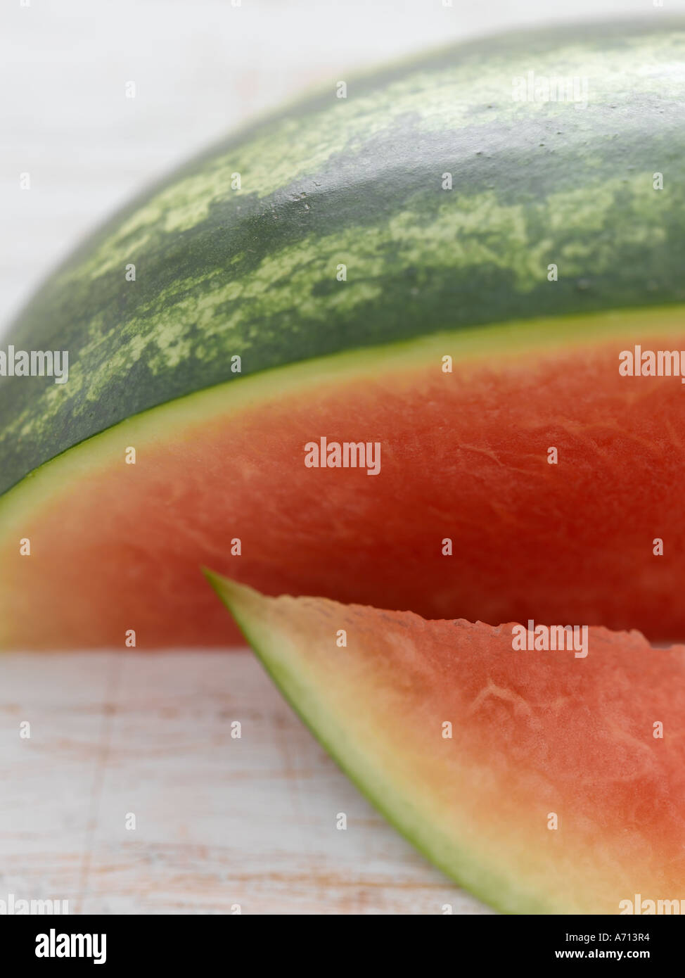 Watermelon on pale wood background - high end Hasselblad 61mb digital image Stock Photo