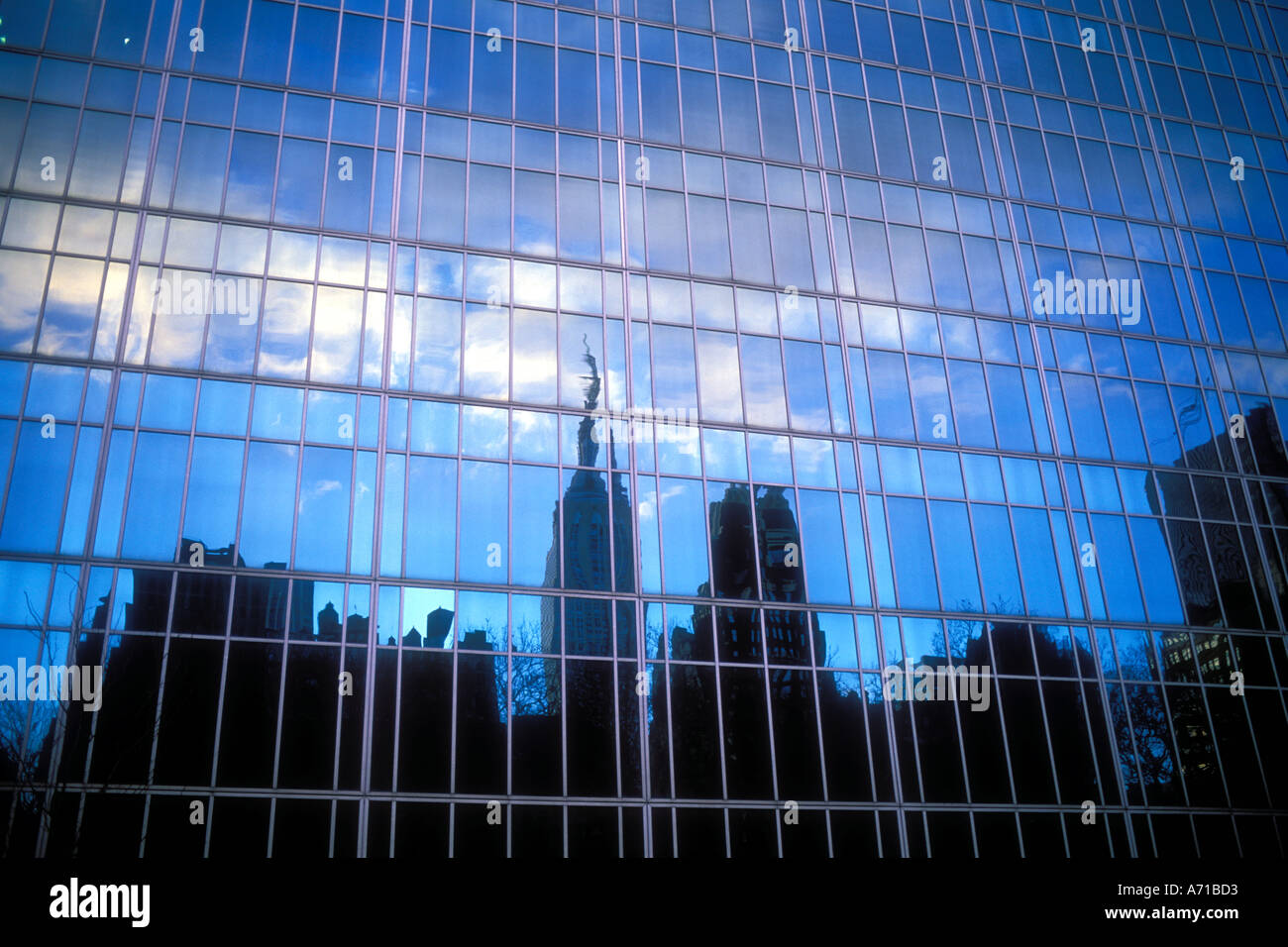 New York City skyline reflected in glass building New York City USA