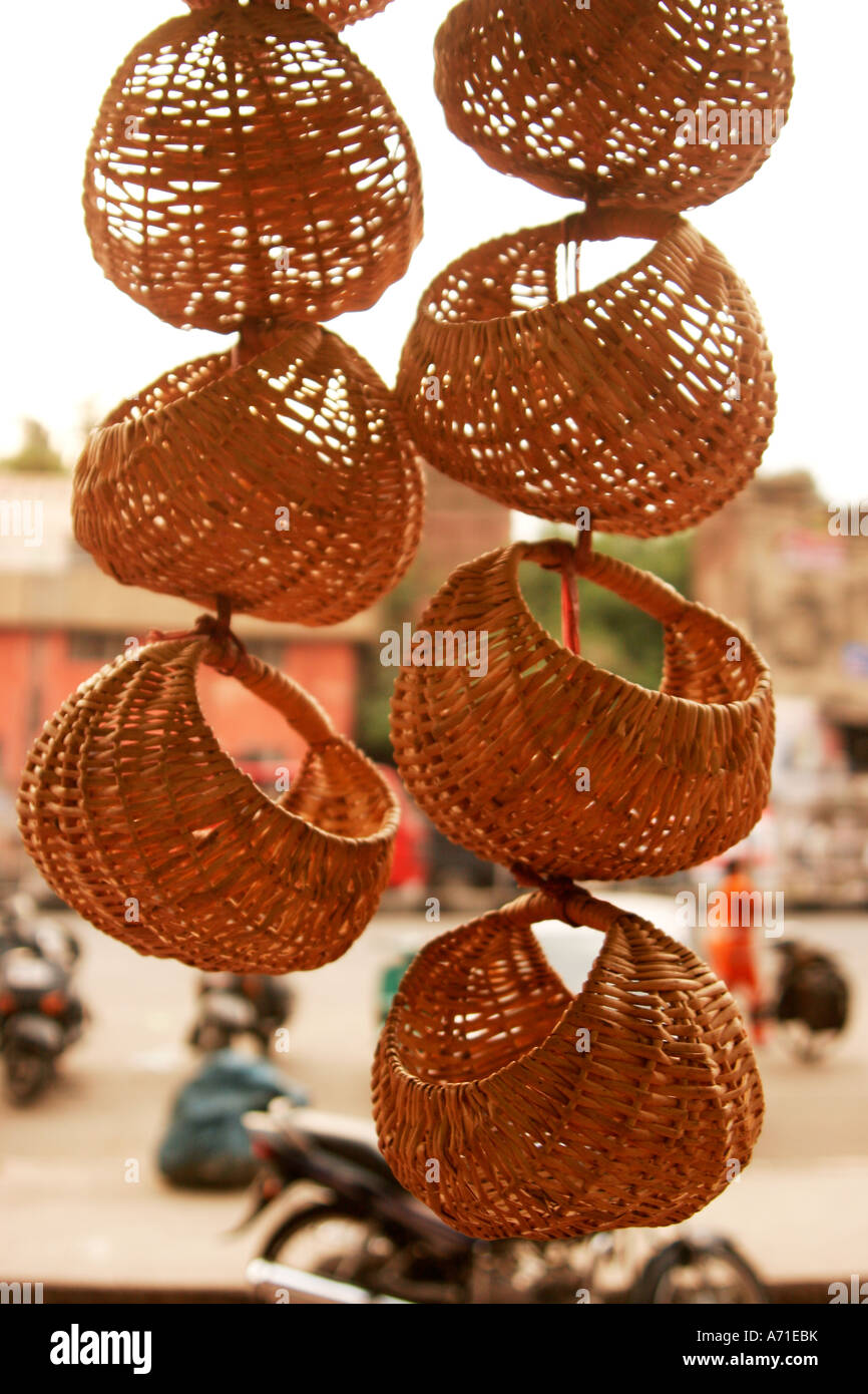 Baskets are hanging outside the dry fruit shop in the state of Jammu