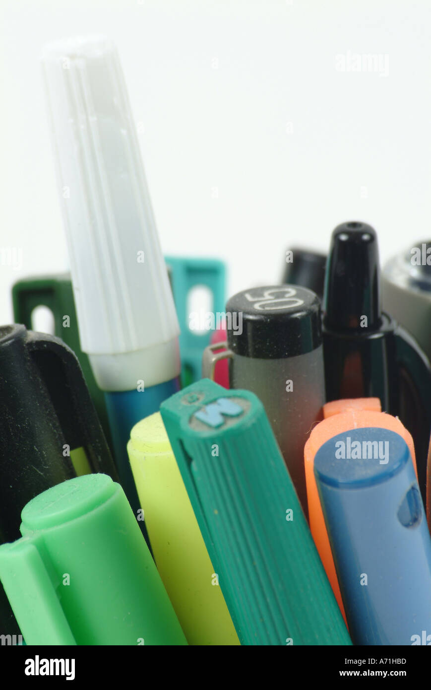 Collection of pens and markers in a clear glass jar Stock Photo Alamy