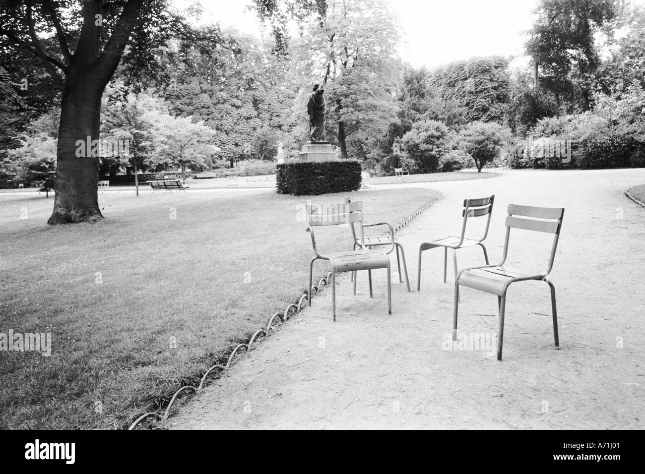 FRANCE, Paris Luxembourg Gardens Statue of Liberty & Park Chairs Stock