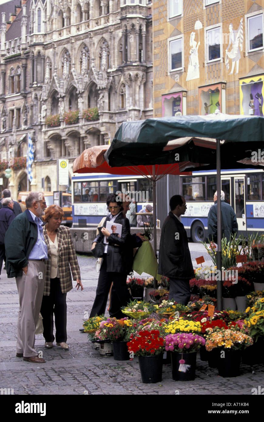 Germany, Munich, Marienplatz Street vendor selling flowers Stock Photo