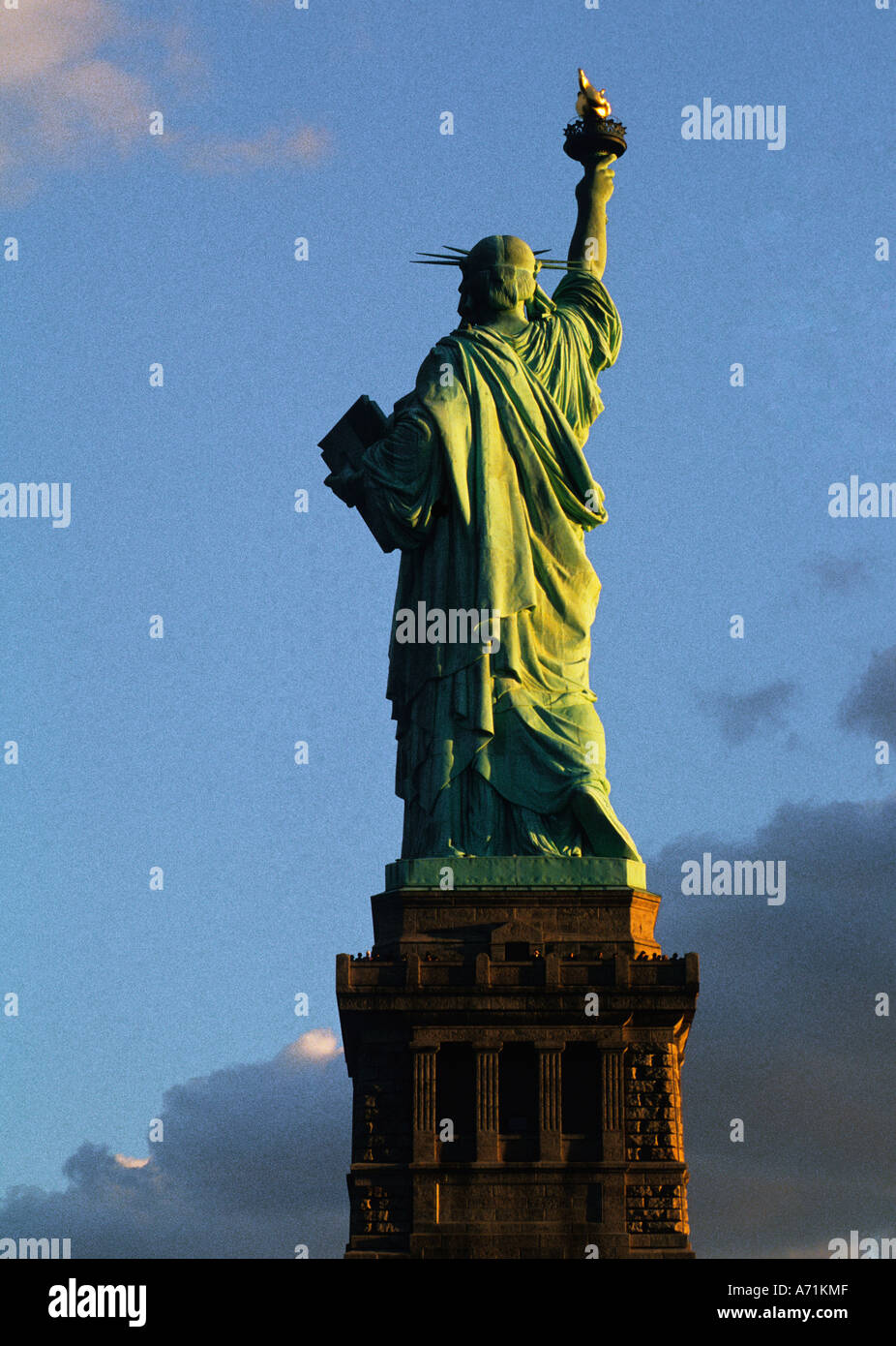Statue of Liberty sunset, New York City landmark historic monument full
