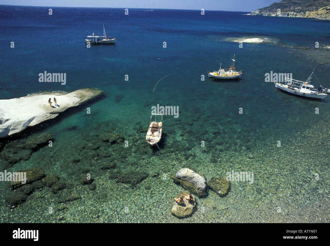Greece, Cyclades Islands, Milos. Gerontas, white sandstone rock fingers and view of Aegean Sea Stock Photo