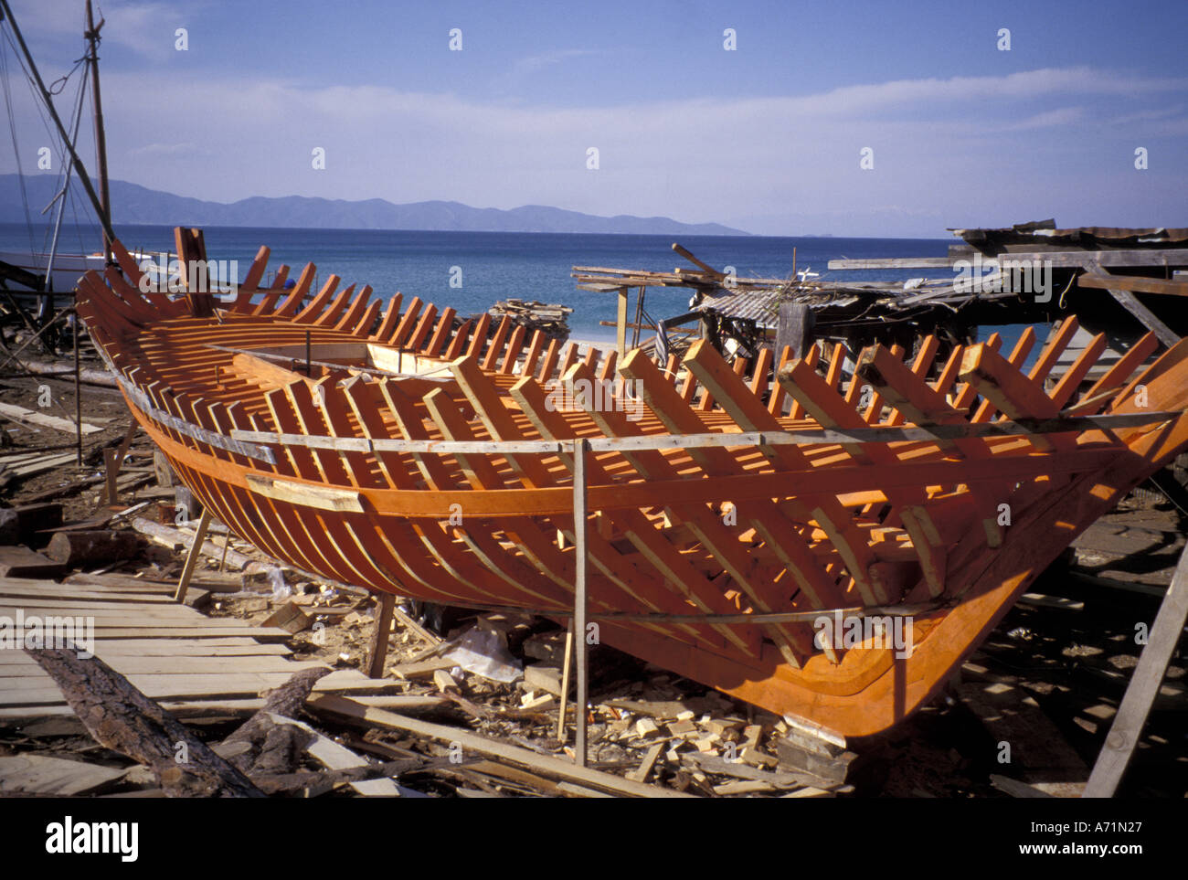 Europe, Greece, Ierissos, Athos Peninsula, Halkidiki. Boat under construction in boatyard. Stock Photo