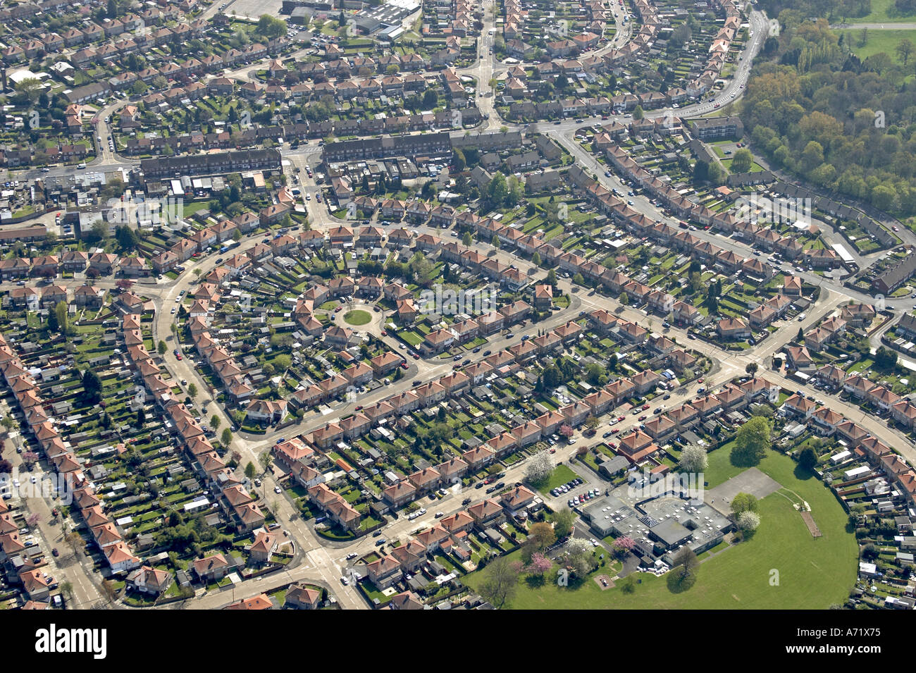 Aerial high level oblique view of houses and suburbs of Hillingdon with Hedgewood School Hayes London UB4 England 2005 Stock Photo