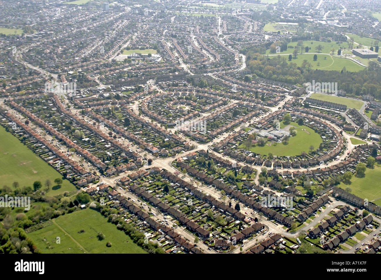 Aerial high level oblique view of houses and suburbs of Hillingdon with Hedgewood School and Hayes Park London UB4 England 20 Stock Photo