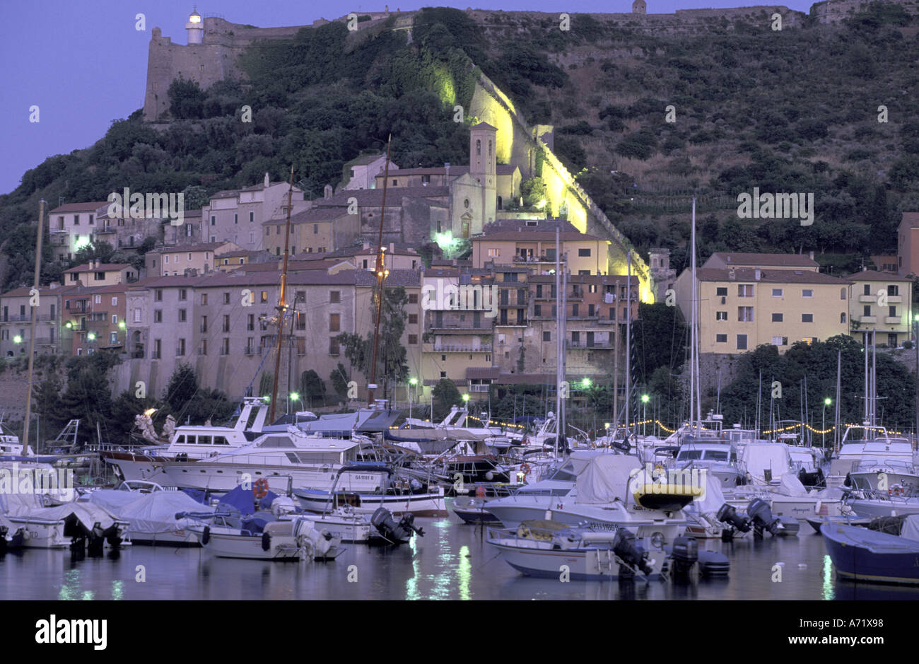 Europe, Italy, Tuscany, Porto Ercole, Evening view of fortress Stock Photo