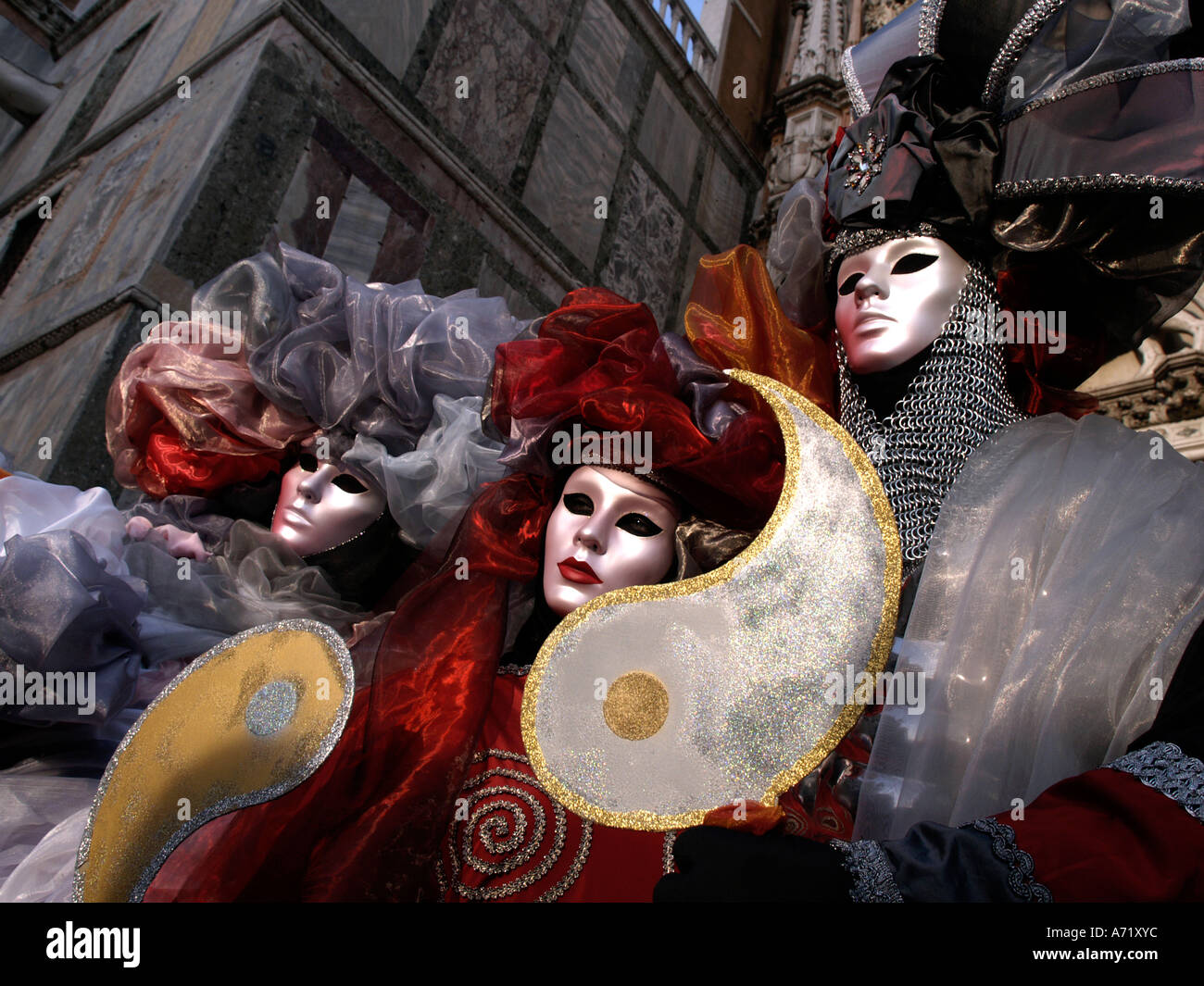 Three masks in venice carnival hi-res stock photography and images - Alamy