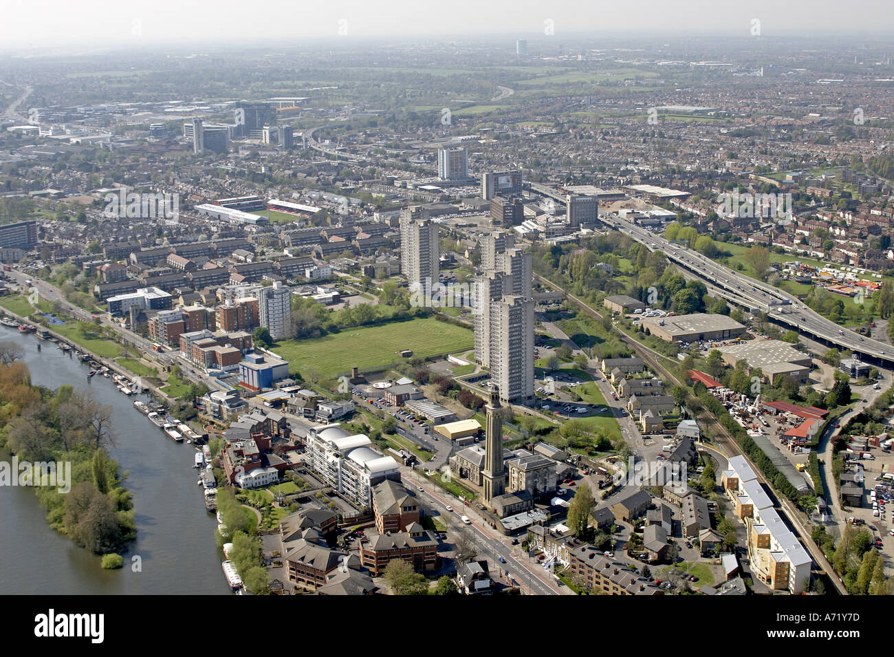 Aerial high level oblique view of Brentford with Council Tower blocks River Thames M4 and A4 London TW7 TW8 England 2005 Stock Photo