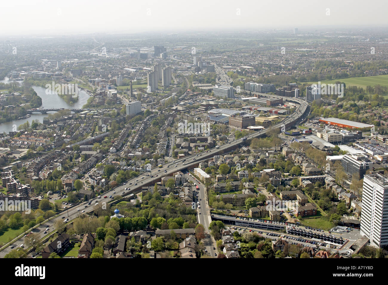 Aerial high level oblique view west of M4 Chiswick Gunnersbury Brentford and River Thames London W4 TW8 England 2005 Stock Photo