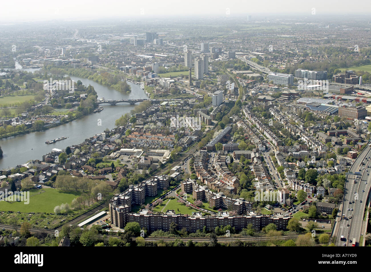Aerial high level oblique view west of M4 Chiswick Gunnersbury Brentford and River Thames London W4 TW8 England 2005 Stock Photo