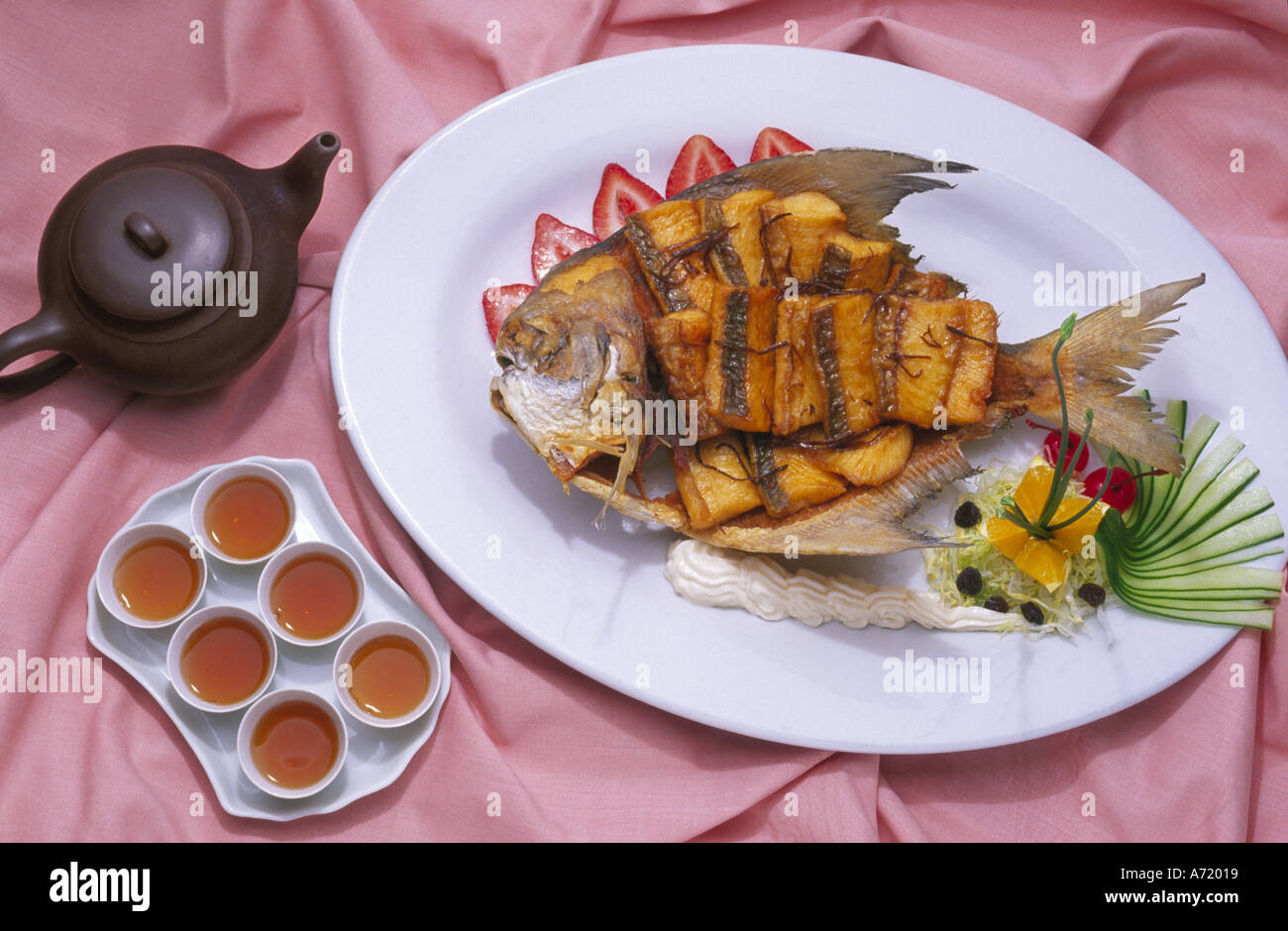 Deep fried fish with Chinese kungfu tea strong tea lifestyle food Stock Photo Alamy