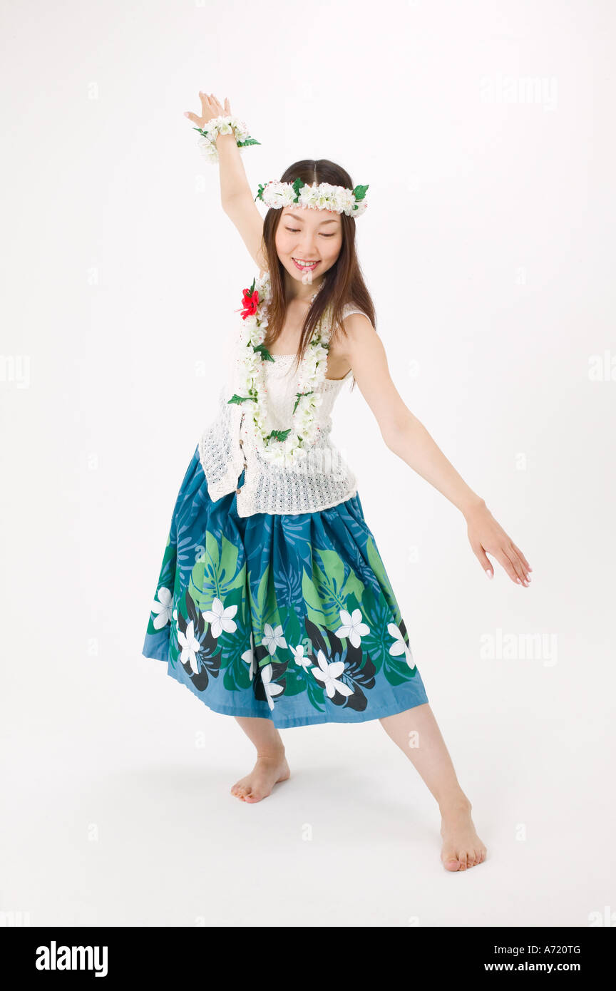 Young woman dancing the hula Stock Photo - Alamy