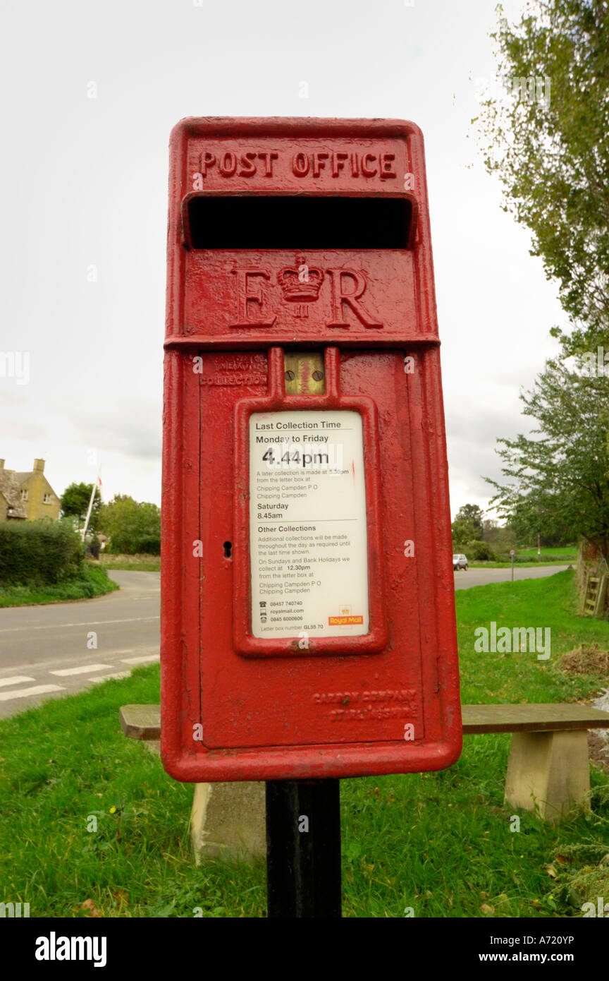 British red postbox for sending mail and postcards Stock Photo - Alamy