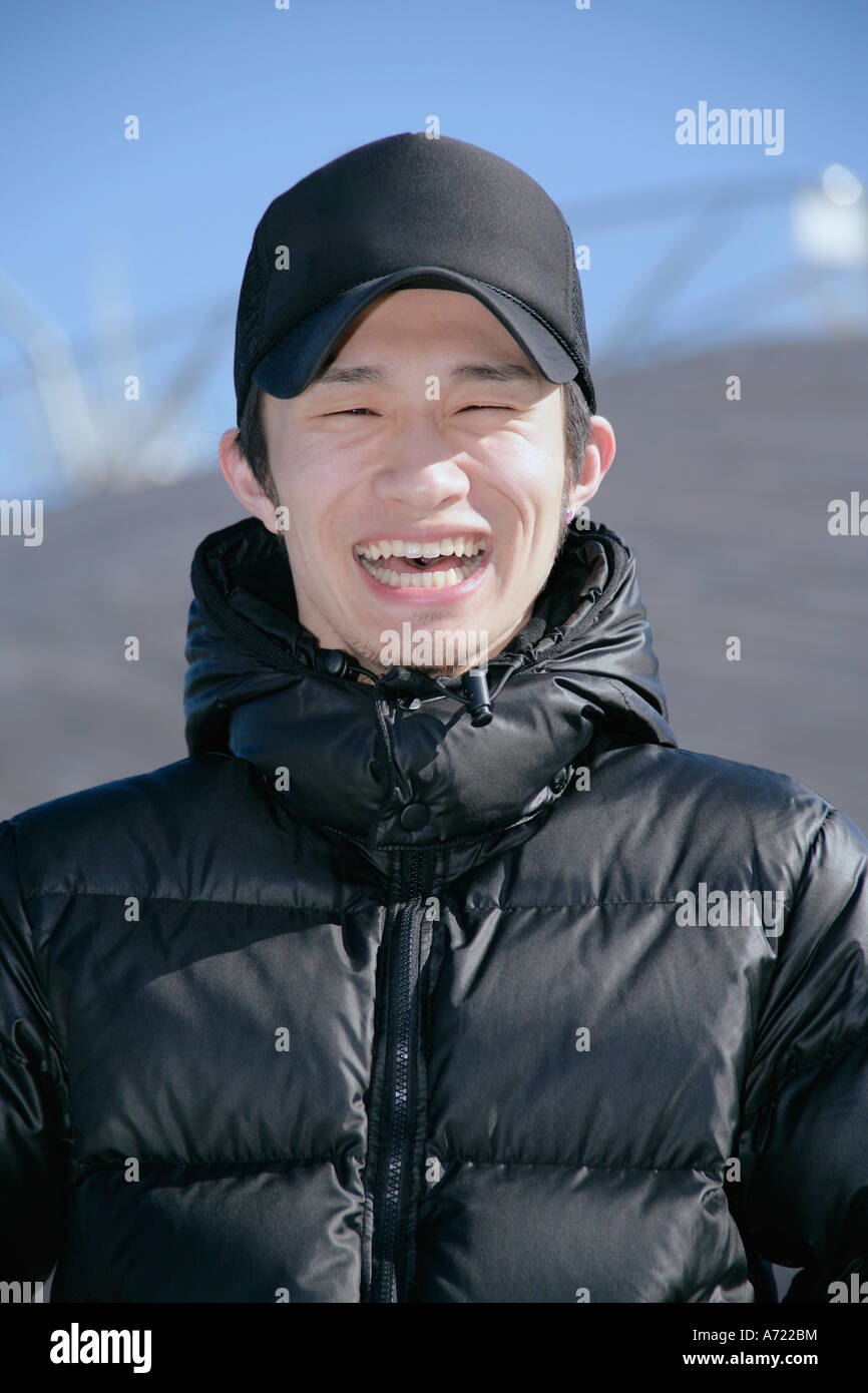Portrait of a young man smiling Stock Photo - Alamy