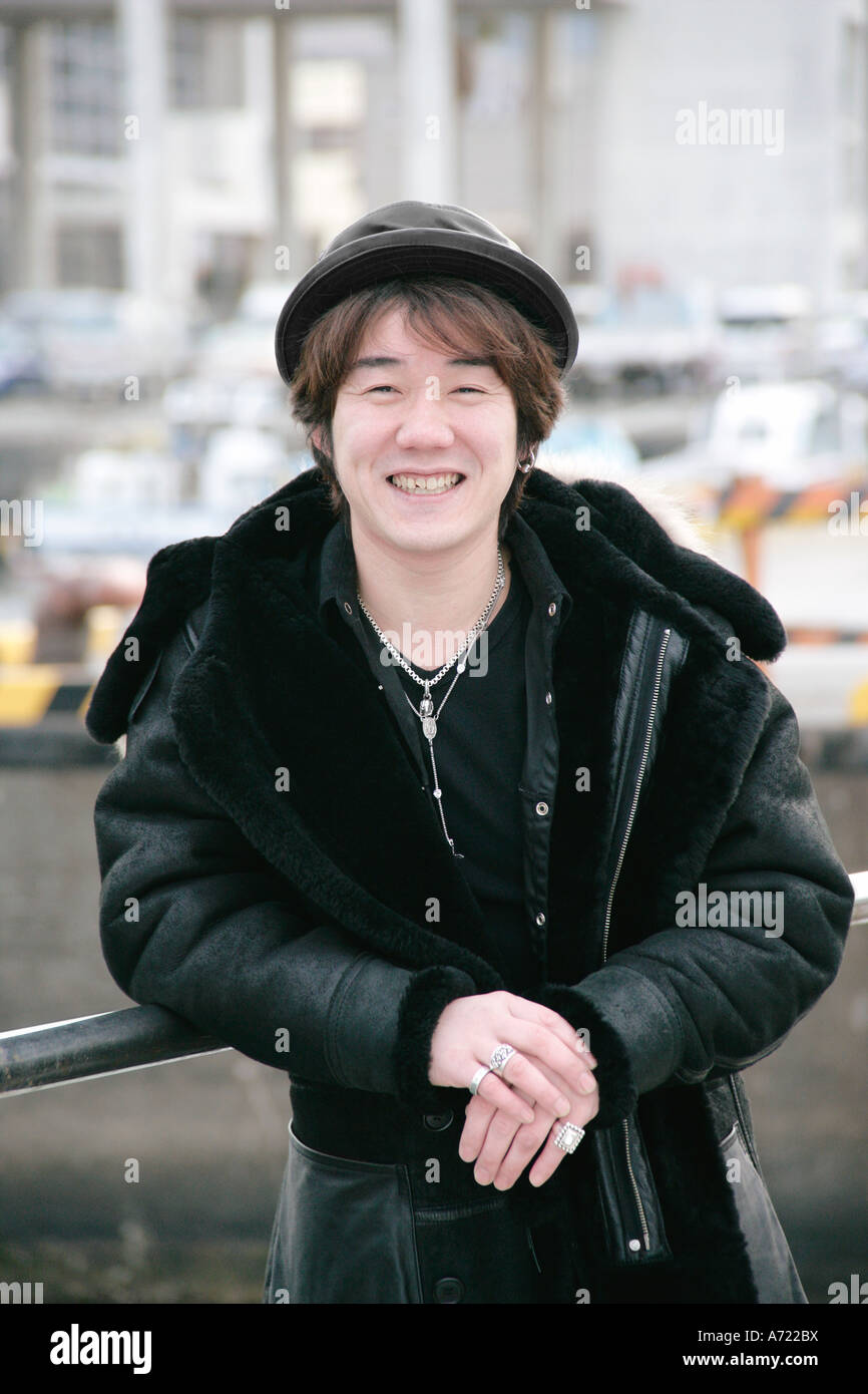 Portrait of a young man smiling Stock Photo - Alamy