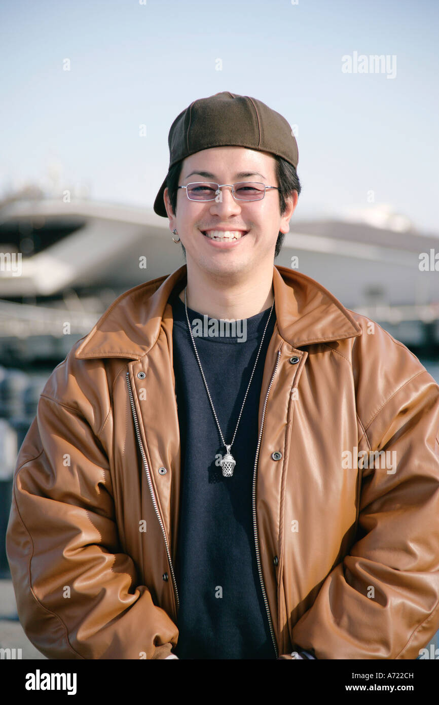 Portrait of a young man smiling Stock Photo - Alamy