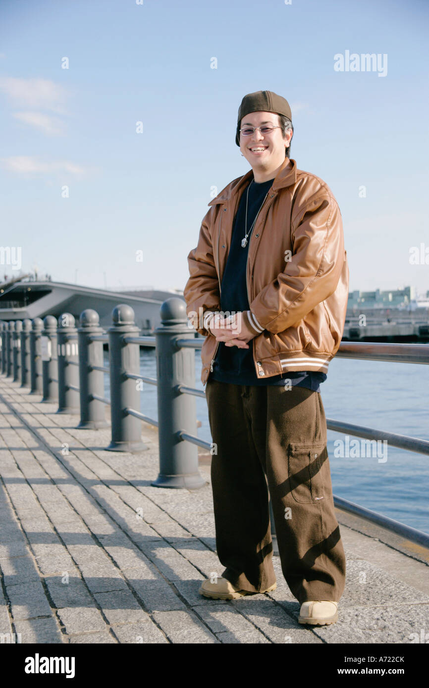Portrait of a young man smiling Stock Photo - Alamy