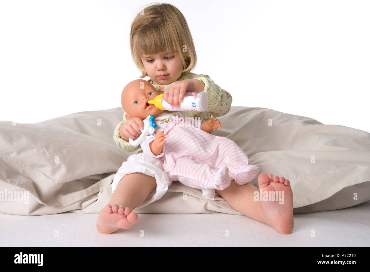 little girl with doll