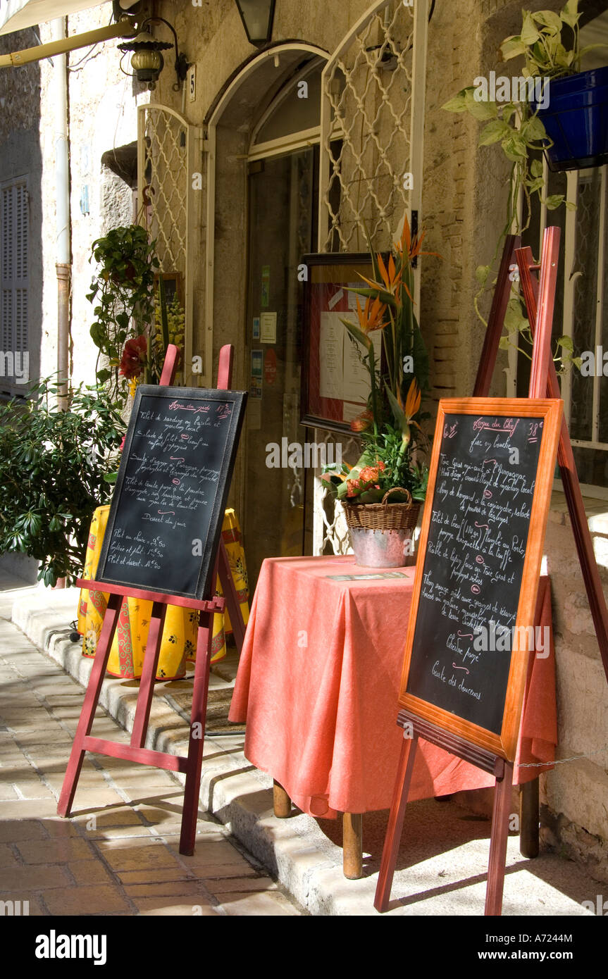 The bill of fare on blackboards displayed outside a little restaurant in the old town of Vence, southern France Stock Photo