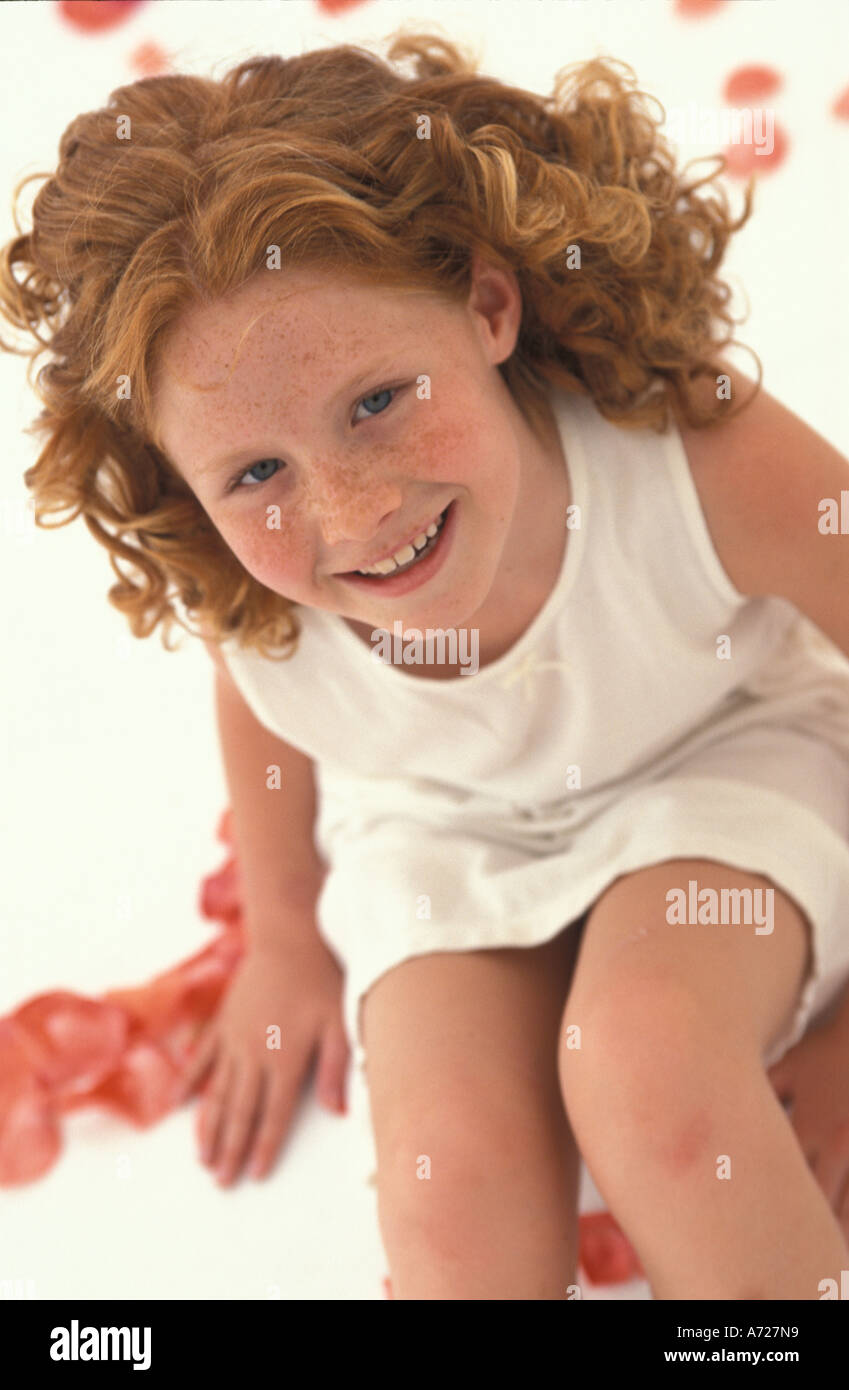 Girl sitting on the floor dress hi-res stock photography and images - Alamy