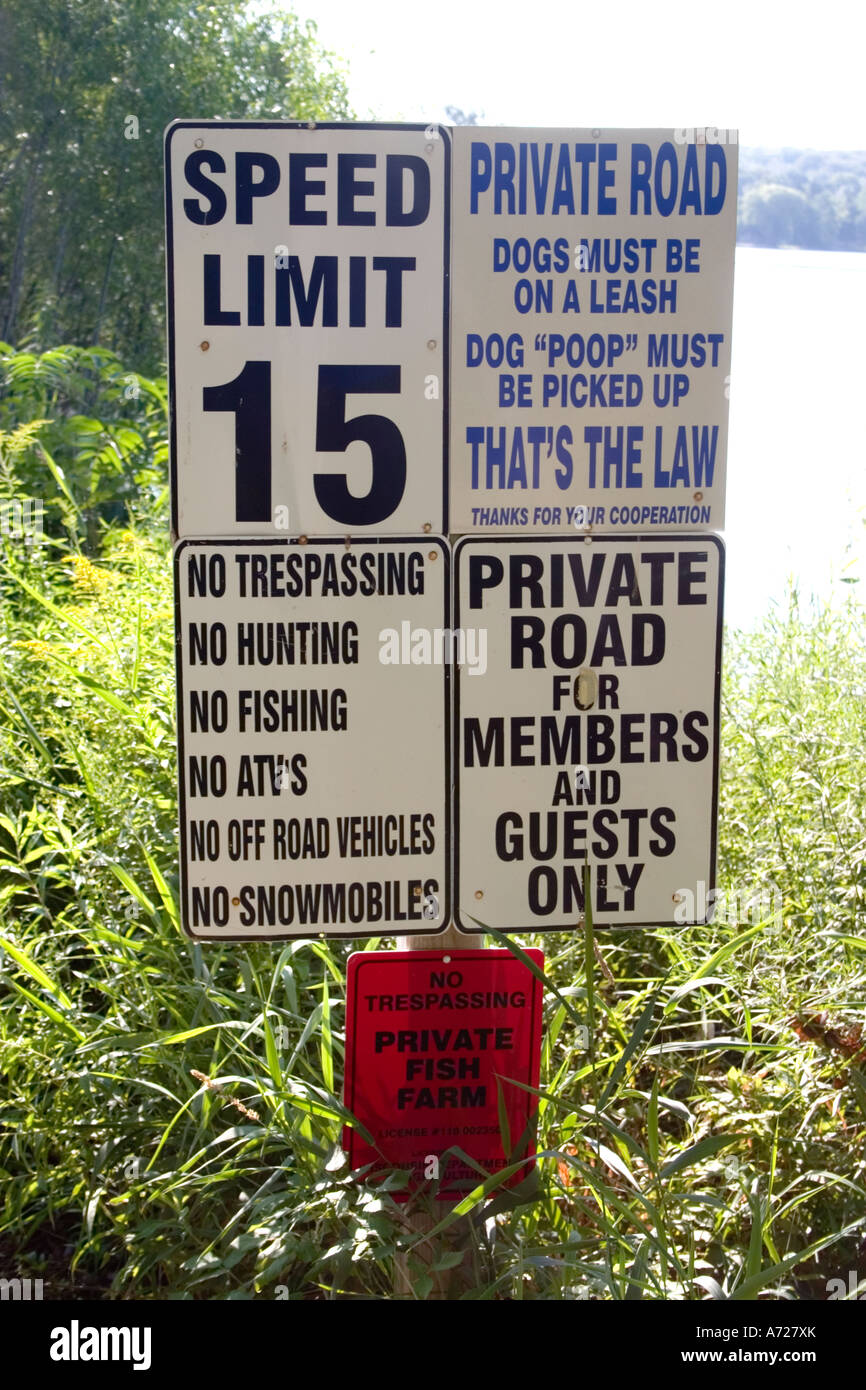 Group of no warning signs for a private road. Kettle Moraine Lake