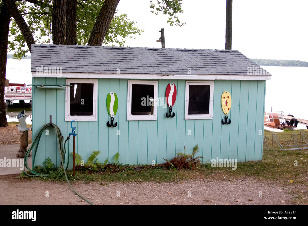 Fishing lure artwork decorating a boathouse. Ashby Resort and