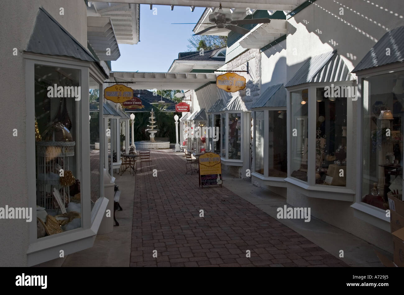 Shops in open air mall with fountain in background Mount Dora Florida