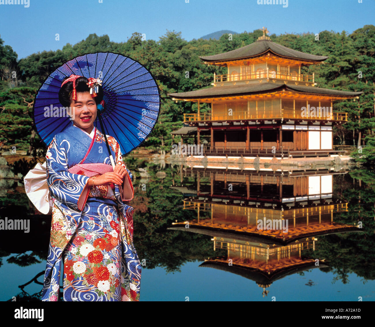 Woman in traditional kimono at Kinkaku-ji Golden Pavilion temple in Kyoto, showcasing perfect kimono photography backdrop