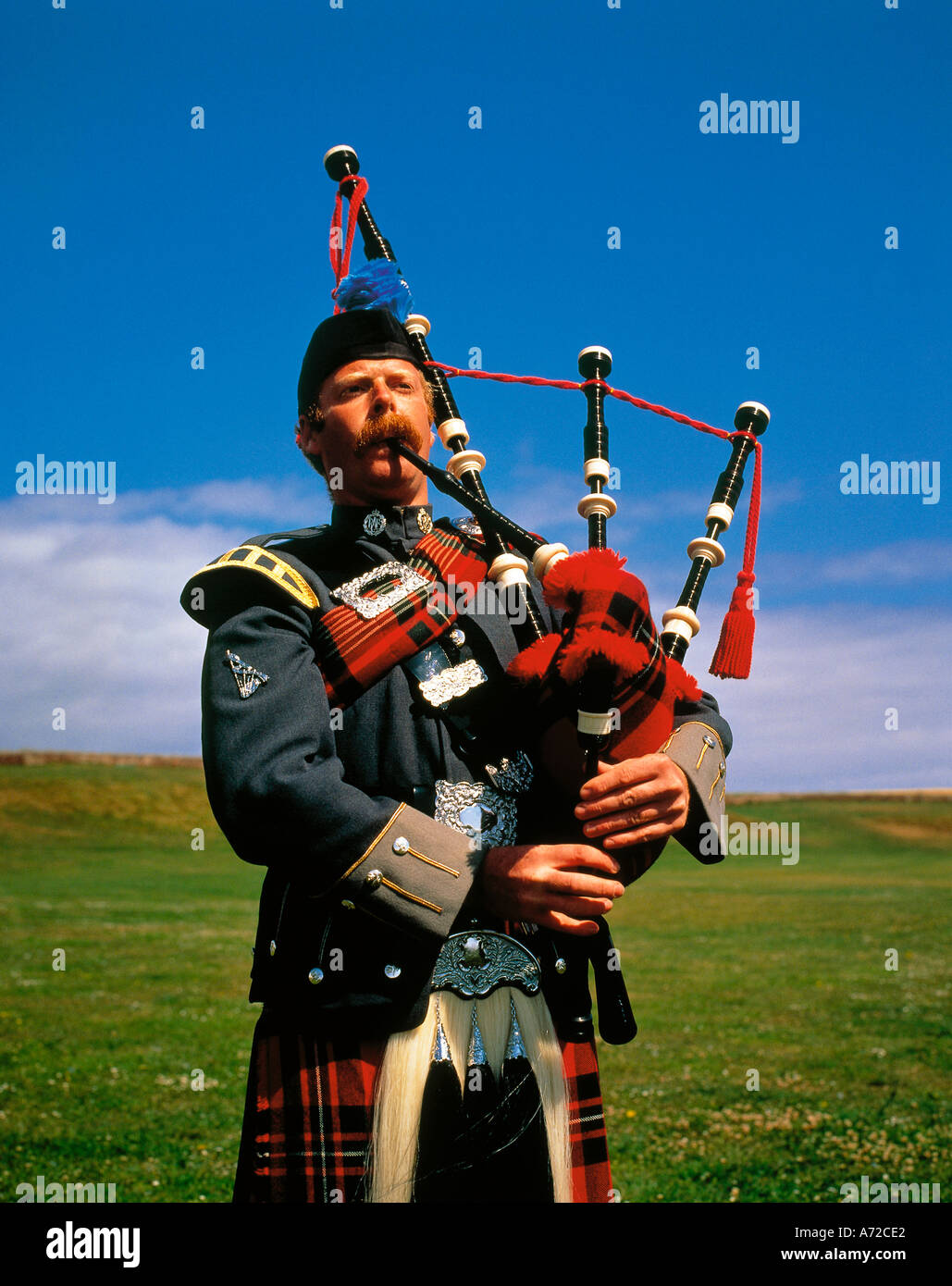 Scottish Piper Blowing Bagpipes Scotland United Kingdom Great Britain
